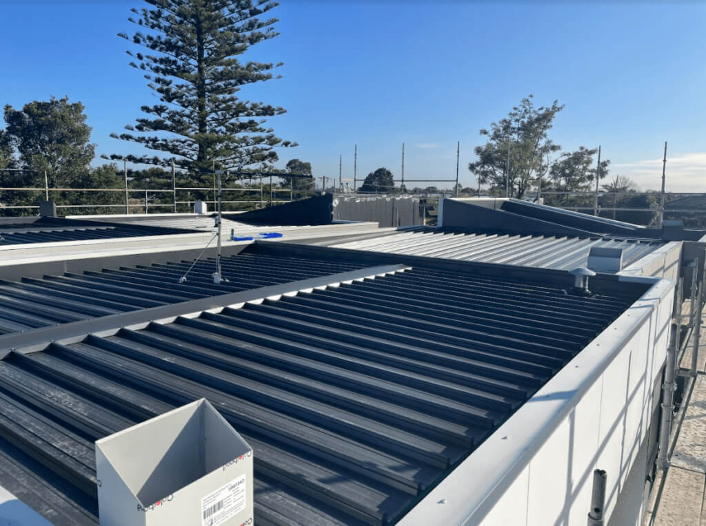 total roofing and cladding - flat metal roofing, new apartment roofing